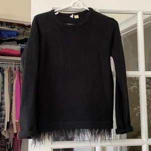 Anthropologie black sweater with feather detail